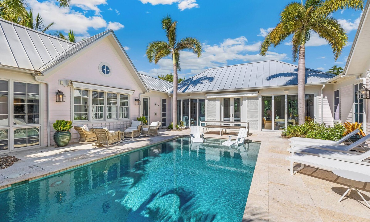 Boca Grande House | Experience luxury in this spacious 4-bedroom, 5-bathroom single-family home with a pool.