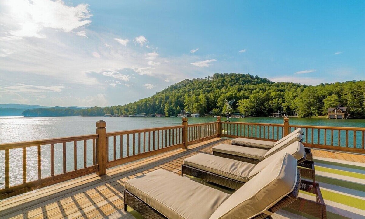 Tiger House | Lakefront 4BR, 4.5BA retreat with boathouse, fire pit, and serene Lake Burton views.