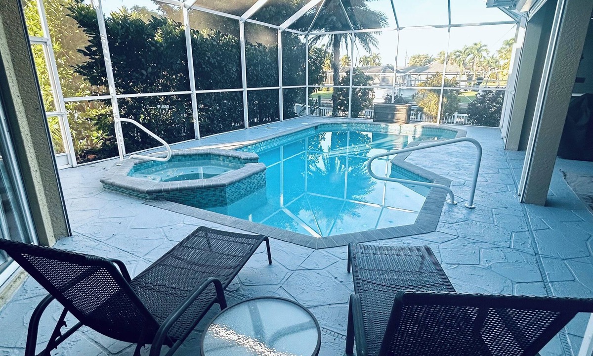 Yacht Club House | Spacious 4 bed 3 bath heated pool home with hot tub in prime Cape Coral location