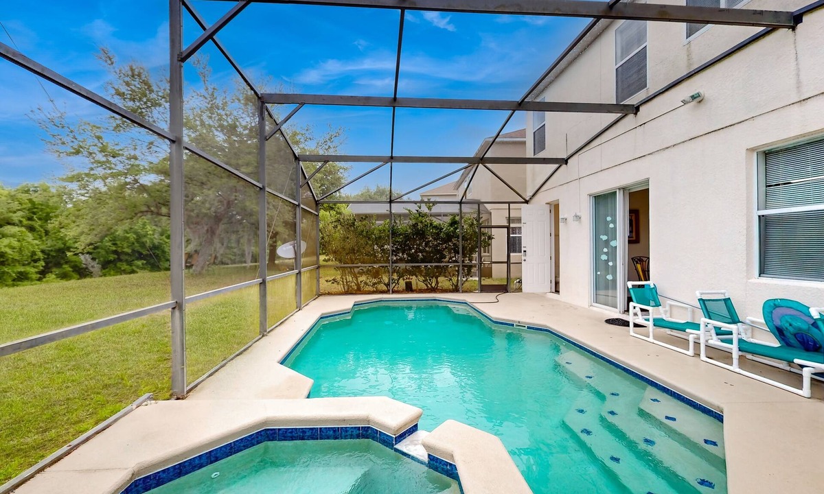 Legacy Park House | Spacious home with screened private pool/spa, & game room - near theme parks