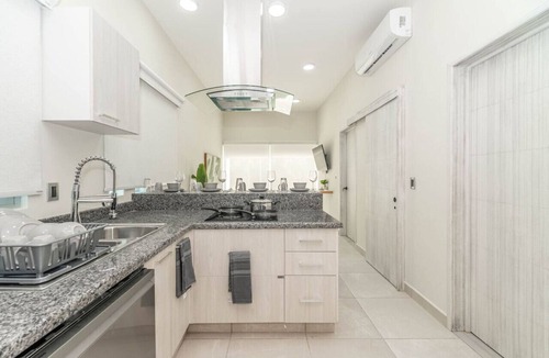 Villa Juarez Condo | 2 BD w/Balcony, Gym, Rooftop Pool + Jacuzzi