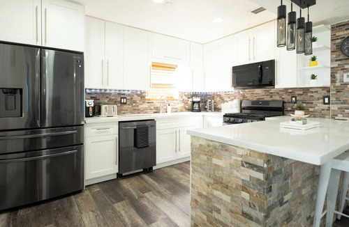 Driftwood House | 4BR Saltwater Pool · Ping-Pong & Outdoor TV Lounge