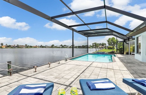 Pelican House | 80-ft Waterfront Resort-like Retreat to Relax; Heated Pool, Jacuzzi, Bikes, Pier