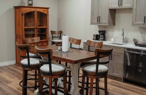 Eagle Bay House | A relaxing lake view at Eagle Bay Manor suite and hot tub