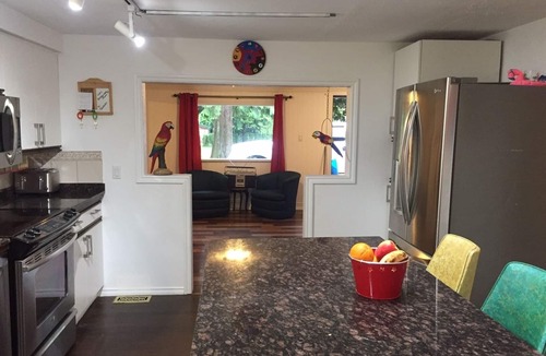 Hatzic House | A true lakefront retro cottage with a mountain view. Pet and kid friendly!