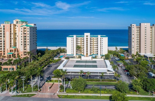 Marco Island Condo | Beachfront 1BR Apollo condo with pool, kitchen, and Gulf views.
