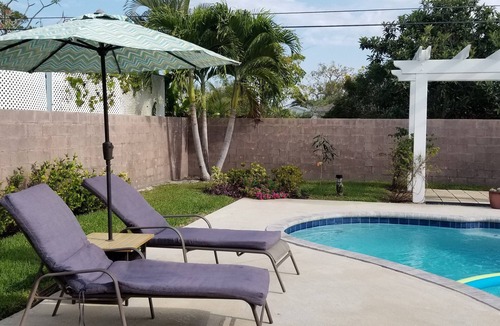 Naples Park House | Bike to beach! Heated pool, pet-friendly. Summer 2026 sale!