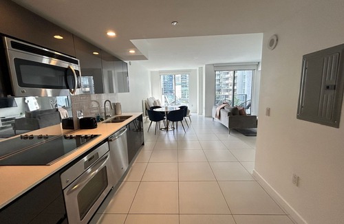 Brickell Condo | Bright condo w/AC in charming Miami perfect for your getaway Brickell, gym view