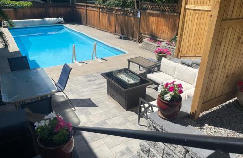 Okanagan-Similkameen Apartment | Bright poolside walkout two bedroom basement suite in the Okanagan