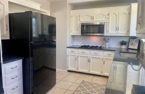Overland Park House | Charming 3-bedroom house in peaceful Overland Park with garage and yard!