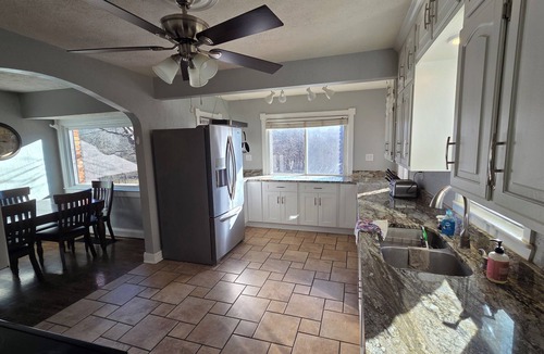 Kansas City House | Country Quiet in the City - Easy Access to Legends & Downtown - 4 BR Brick Home