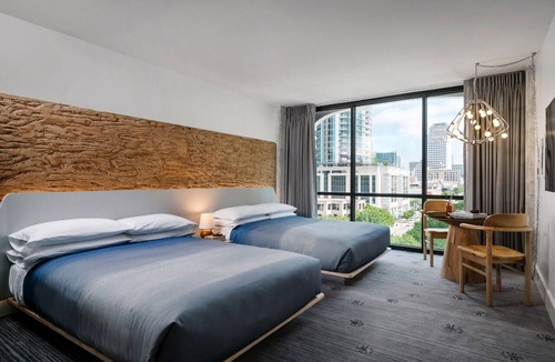 Congress Avenue Historic District Hotel | Family Haven, Poolside Bliss, Austin Serenity Awaits, Pets Stay For Free!