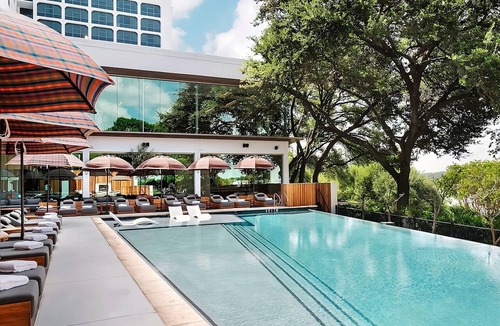 Congress Avenue Historic District Hotel | Family Haven, Poolside Bliss, Austin Serenity Awaits, Pets Stay For Free!