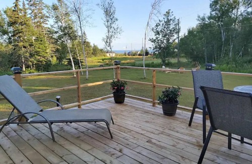 Wood Islands Cottage | Five-minute walk to the sandy beach: Starfish Cottage awaits.