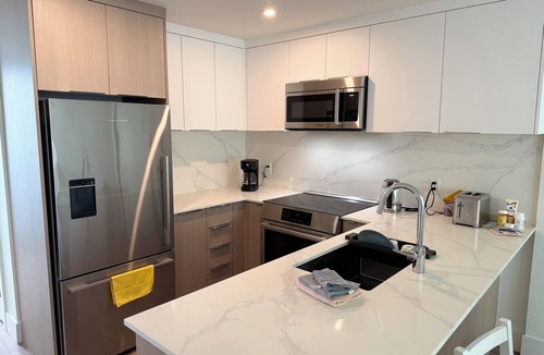 Grandview-Woodland Apartment | Furnished Brand-New 2B2B+Flex Condo Near Commercial Drive