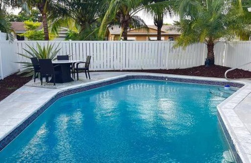 Palm Aire Village West Villa | Gorgeous open concept 4 BR with heated pool and lounge area
