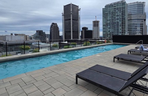 International District Apartment | Humaniti - Serviced 1-Bedroom in Montreal