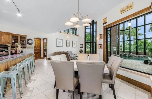 Burnt Store Marina Villa | Large Family Getaway-Unique Indoor Oasis w/heated pool, hot tub, pool table!