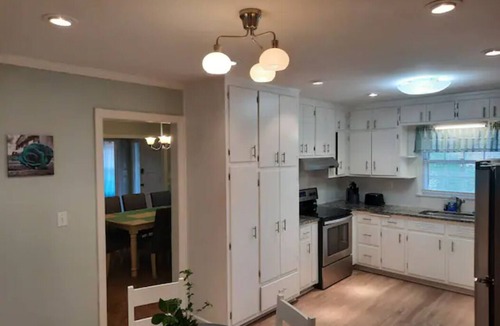 East Point House | Large Home Close to Attractions Sleeps 20+