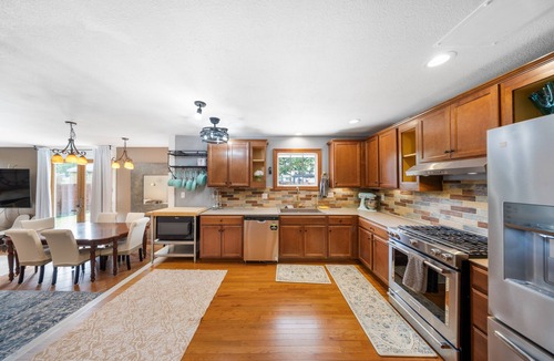 Olathe House | Large Home with 14 beds! Bunk House, Outdoor Patio and plenty of Parking