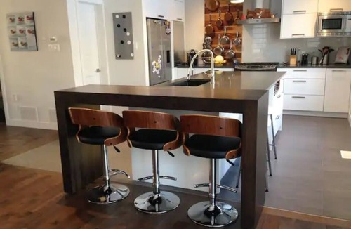 Greenfield Park Cottage | Large modern house with open concept, a/c, heated swimming pool, large garden.