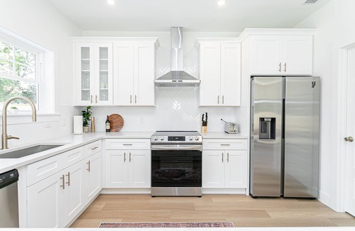 Vilano Beach House | Luxury heated pool & spa home, pool bar, steps to the beach & two master suites!