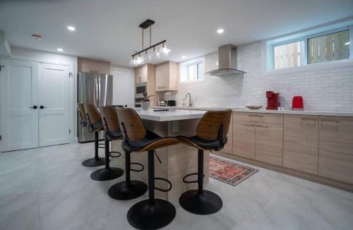 Seven Oaks Apartment | Modern 3BR Basement Retreat with Workspace & Parking