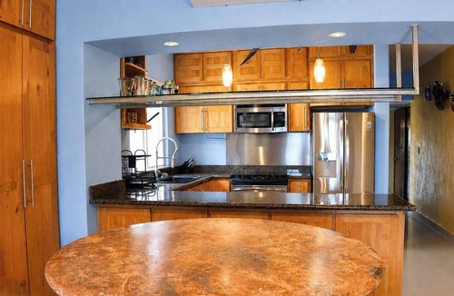 Nopolo Condo | Ocean-view 1BR condo with pool, AC, kitchen, and washer/dryer.