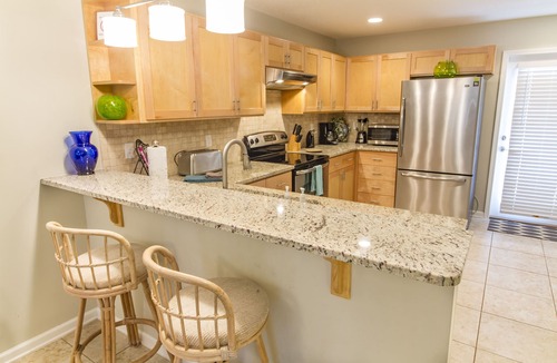Butler Beach House | Pet Friendly Duplex Home with Ocean Views, Balconies -Two Units
