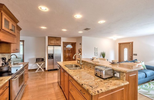 Ormond Shores Estates House | PVT OASIS HTD Pool Home Beach/River/Kayaks/Surf/Bikes/GameRm/Fireplace/Ping Pong