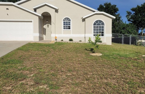 Lake Wales House | Relax in this remodeled home with screened 36-ft pool, patio & fire pit.