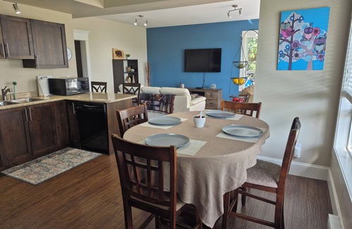 Lower Sumas Mountain Apartment | Scenic 2 bdrm walkout suite with shared hot-tub, outdoor pool, and view of park.