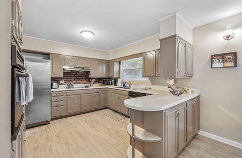 East Point House | Spacious 6BR Fun Near Airport Pool HotTub GameRoom BBQ
