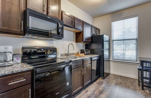 Wells Branch Apartment | Spacious CozySuites on I-35 w/pool and parking #01