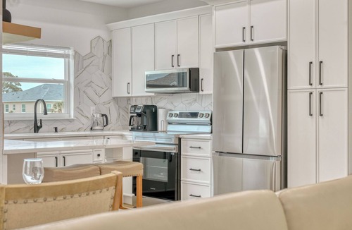 Pebble Beach House | Spacious waterfront 6 Bd duplex in lovely Rotonda West near oceans .