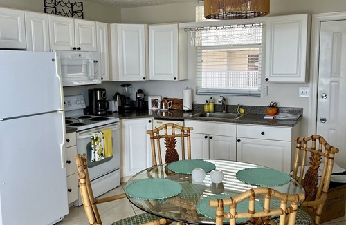 Bonita Springs Condo | Spectacular 9th Floor Views and Sunsets! Steps to the beach. Free in suite WiFi.