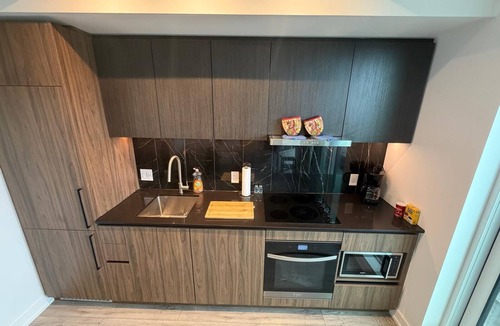 North York Condo | Sun-Drenched Penthouse Retreat with Gym & Parking