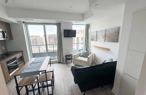 North York Condo | Sun-Drenched Penthouse Retreat with Gym & Parking