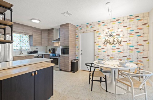 Ridge Wood Heights House | The Sarasota Starburst: Mid-Century Modern Home with Heated Pool, Dog Friendly, & Ideal Work Setup