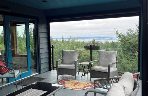 Regional District of Nanaimo House | Tree house in Nanoose Bay. Above the trees take in spectacular coastal views!