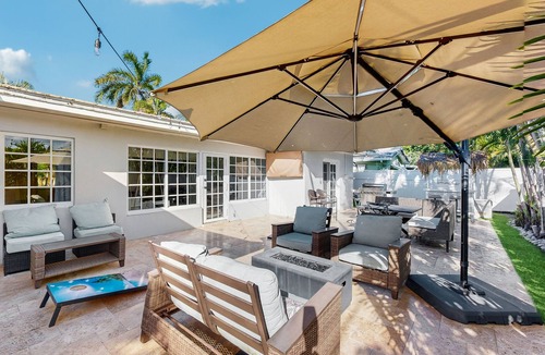Santa Barbara Estates House | Tropical backyard oasis w/putting green, grill, tiki bar & walk to beach