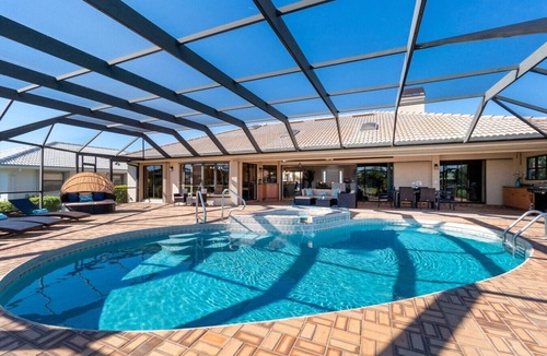 Punta Gorda House | Tropical Waterfront Villa with Heated Pool & Spa