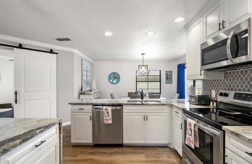 Englewood East House | Turquoise Turtle - pool and spa, beautifully furnished