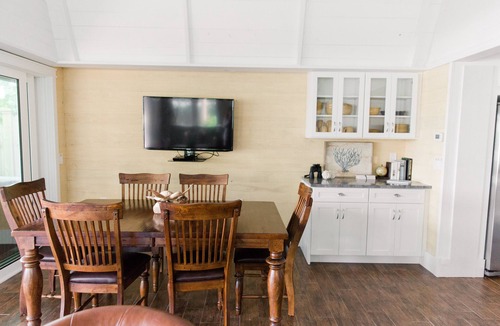 Placida House | Use our kayaks to explore; your boat is in view at our dock; boardwalk to beach