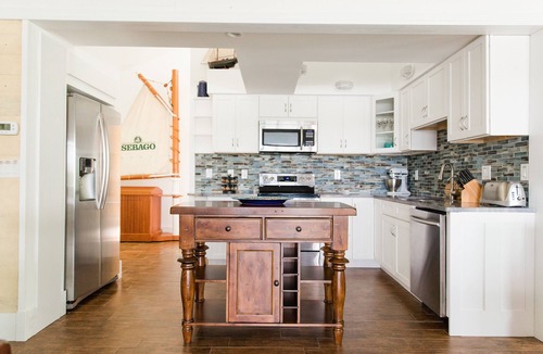 Placida House | Use our kayaks to explore; your boat is in view at our dock; boardwalk to beach