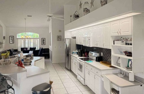 Yacht Club House | Villa Euphoria: Chic 2-unit, canal-front retreat with 2 pools & private dock