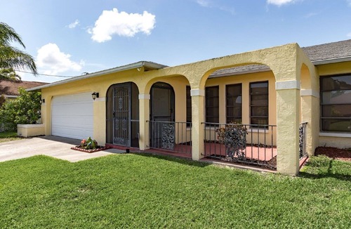 Fort Myers Villa | Waterfront Heated Pool Retreat with Dock Pet Friendly Sleeps 6 in Cape Coral