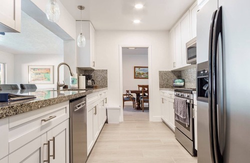 Garden Isles House | Waterfront Heated Pool + SUPs - 5BR Fun Stay!