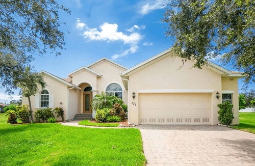 Long Meadow House | Welcoming 3-bedroom water front house with heated pool Rotonda West