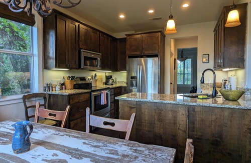 Leander House | Welcoming home overlooking lake with forested hill country views
